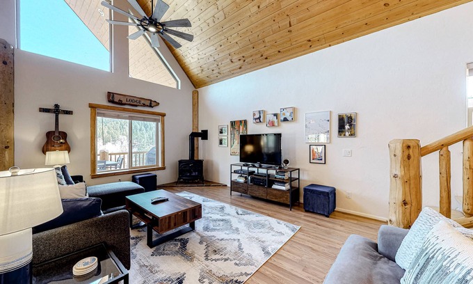San Juan River Village House | Riverfront home with amazing mountain view, private hot tub, deck & fireplace