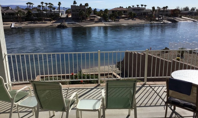 Needles House | Riverfront Home with Beach and Large Front Patio