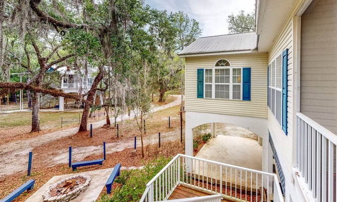 Bell House | Riverfront home with screened porch, shared dock