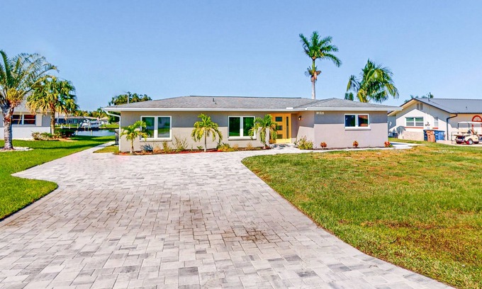 Fort Myers Shores House | Riverfront home with beautiful views, private pool, screened lanai, grill, & W/D