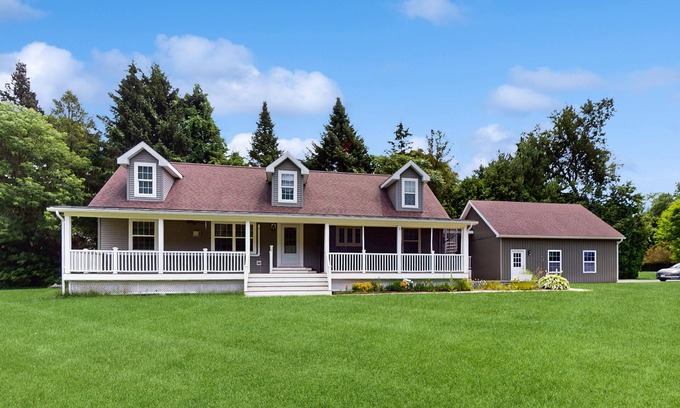 Arlington House | Riverfront house, dog-friendly, mountain views, a/c, porch, deck, gas stove, w/d