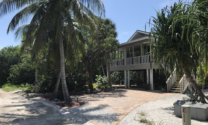 North Captiva Cottage | Romantic beach home with golf cart Remodeled Coastal charm