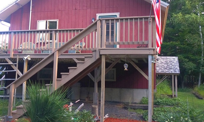 Beaver Cove House | Romantic sunset and lake view getaway w/wrap around deck, hot tub, & fireplace
