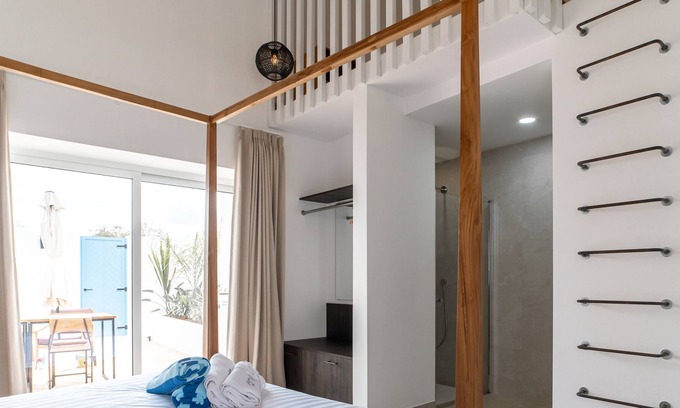 Poco Partido Bed & Breakfast | Room with mezzanine + breakfast