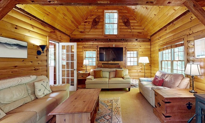 Plymouth House | Roomy farmhouse with private hot tub, firepit, pool table, sunroom, & woodstove