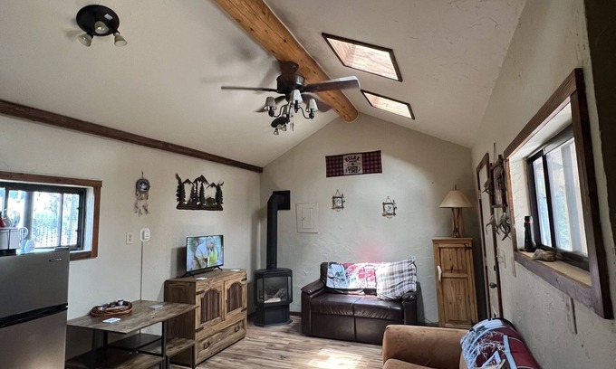 Woodland Park Cabin | Rose Mountain Escape is peaceful with beautiful views and we are pet friendly.