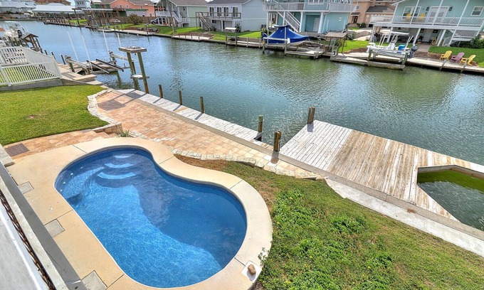 City-by-the Sea House | Royal Estes! Large Home! Canal front! Private pool! Firepit!