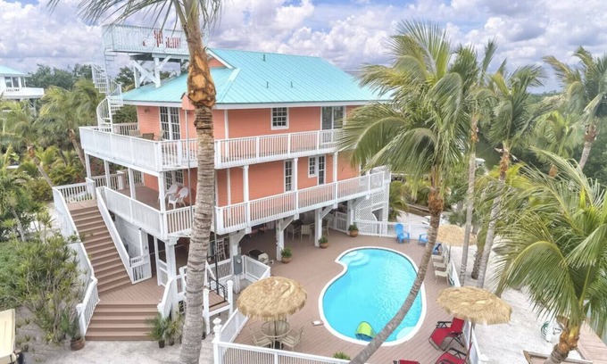 Captiva House | Rum Cove: Private Heated Pool, Golf Cart, Docks, Airstrip & Sleeps 10