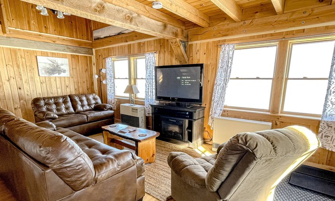 Rockwood Cabin | Rustic dog-friendly lakefront home with private beach, lake views, firepit, AC