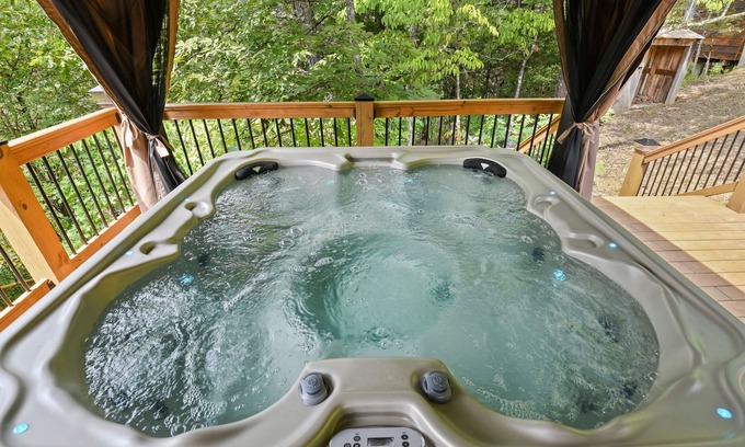 Sevierville Cabin | Rustic Hideaway 4 Bedroom Cabin by RedAwning