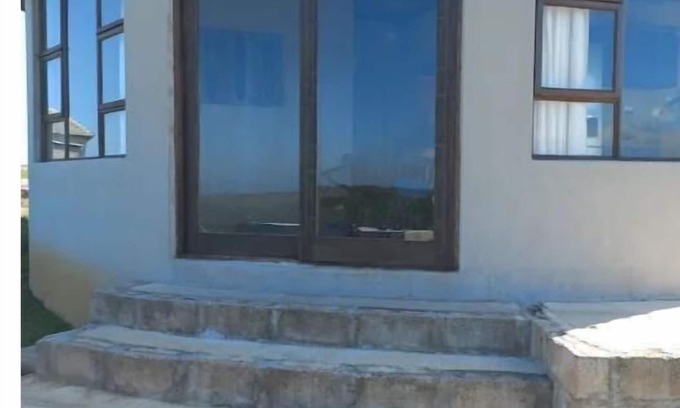 Lusikisiki Cottage | Rustic Retreat In A Peaceful Village. Overlooking The River And Ocean.