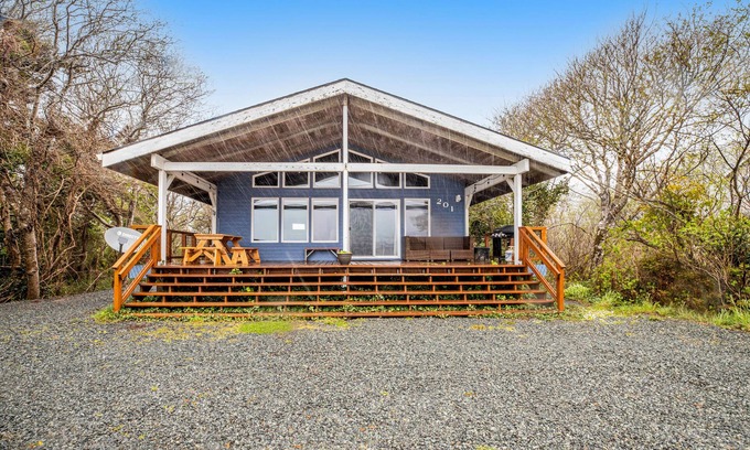Rockaway Beach Cabin | Rustic waterfront woodland lodge w/impressive lake views from patio