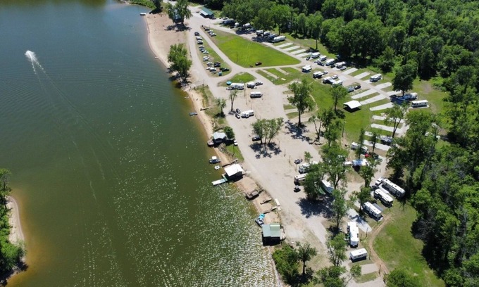 Saint Mary Of The Woods RV Rental | RV on a lake in a campground. Great for parties