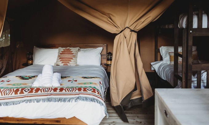 North Woodstock RV Rental | Safari Tent Site 9 | 1 Queen Bed & 1 Bunk Bed | Pond View