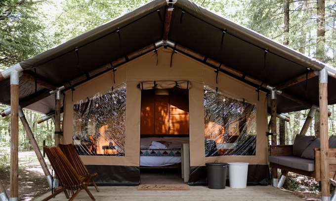 Woodstock RV Rental | Safari Tent Site 4 | 1 King Bed | Pond View