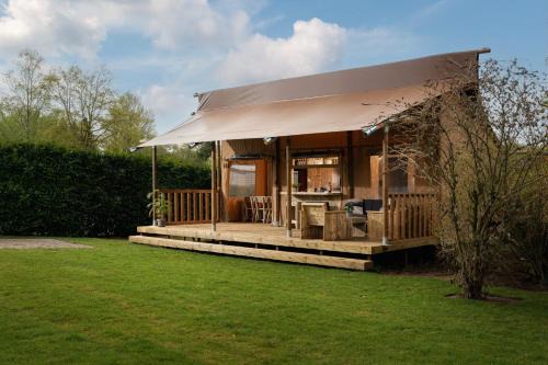 Zuna House | Safari tent the bartenter with private sanitary facilities 5 pers.