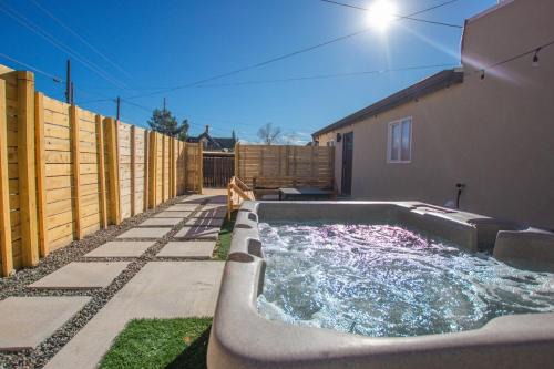 South Broadway Apartment | Sage Suite at ArnoTriplex! Hot Tub and Pet Friendly!