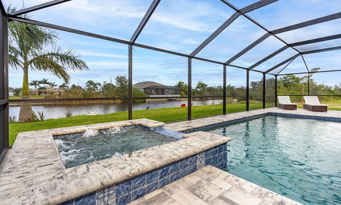 Burnt Store House | Salt water pool home with hot tub on fresh water canal and 40 foot pier 🌴