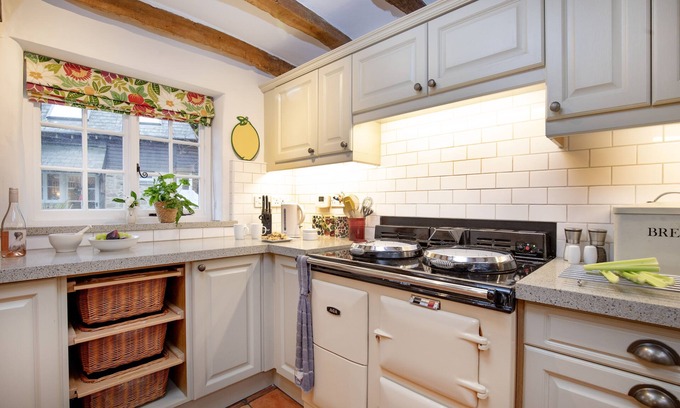 South Tawton Cottage | Sampsons boasts a plethora of characterful features, including a wood burning stove, exposed wood