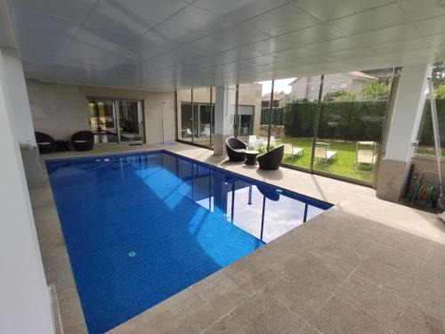 Sanxenxo House | Sanxenxo Casa Rial 47 con PISCINA CLIMATIZADA