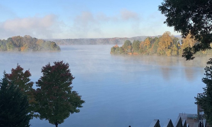 Ten Mile House | Scenic lake house with private covered dual-slip and two covered lake-view decks