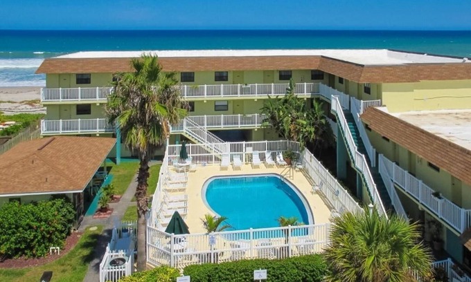 Indialantic Resort | Scenic Pool View Room: Your Romantic Getaway Spot | Free Parking