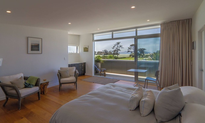 Waipu Apartment | Sea and rural views from your private deck, surrounded by tropical gardens