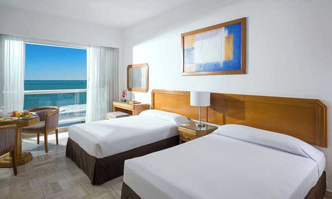 Valle Dorado Apartment | Sea Garden Master Room – Beachside Bliss with Classic Resort Comfort