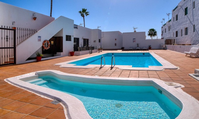 Puerto del Carmen Ski Chalet | Sea Waves Lanzarote - Large terrace, community pool, WiFi with fiber
