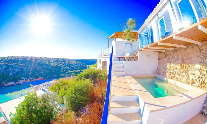 Cala en Porter Villa | Seafront Villa Bellavista with private heated pool
