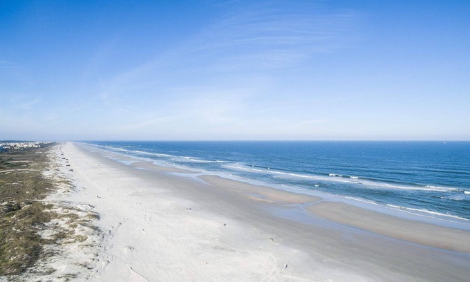 Butler Beach Apartment | Seaside Haven Stylish Condo 3 Pools New Rental