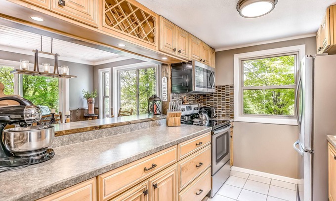Presque Isle House | Secluded 3-lake chain house w/ pontoon boat