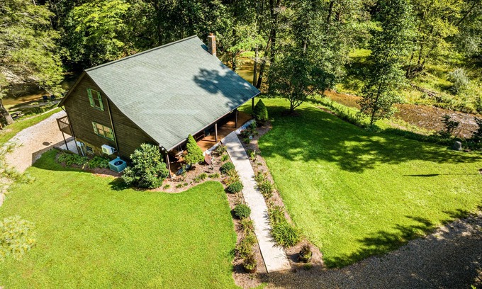 Yadkin Valley Cabin | Secluded Cabin on a mountain stream with water views from all rooms