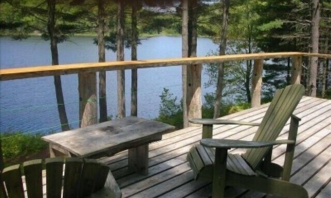 Dysart et al Cabin | Secluded Cabin on Your Own Private Lake Nestled Among 350 Wooded Acres