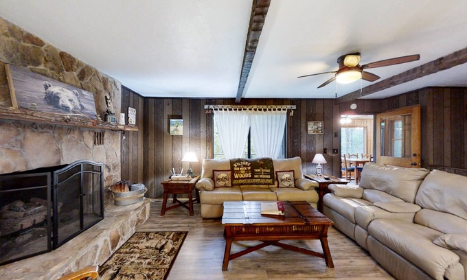 Murphy House | Secluded home with deck, firepit, sunroom, gas fireplace, & W/D