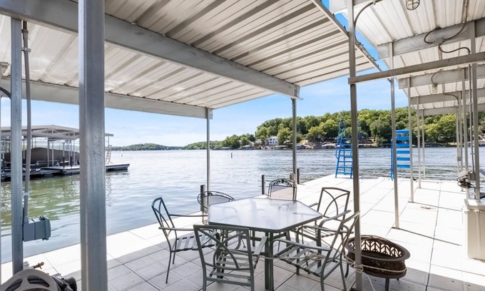 Gravois Mills House | Secluded lakefront home with private dock, multiple decks, gym, swim platform