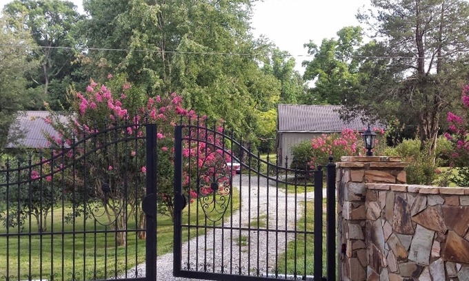 Cleveland House | Secluded mountain-view hideaway with pond, firepit, large yard, fireplace & AC