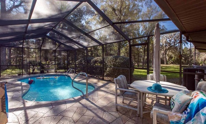 Crystal River House | Secluded riverfront luxury home w/heated pool and private dock- Sleeps 15