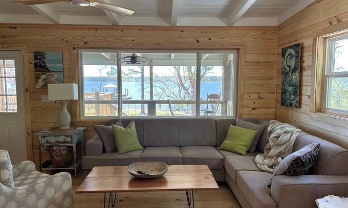 Fairhope Cabin | Secluded waterfront fishing cabin, boat dock, pier, sunsets, boat to beach
