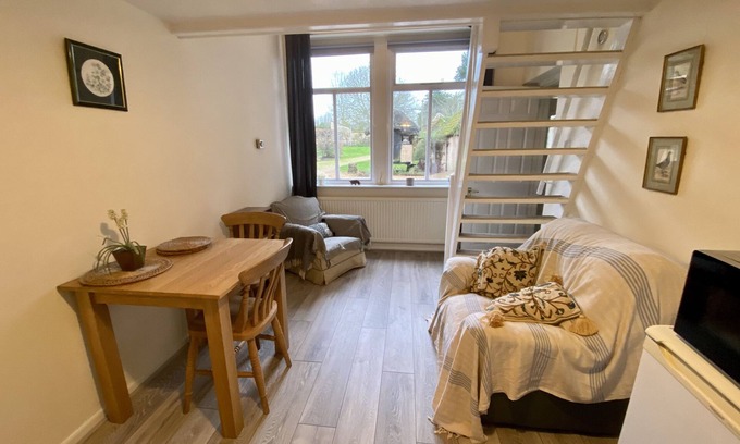 Winterbourne Earls Cottage | Self-catering, galleried studio cottage with parking outside