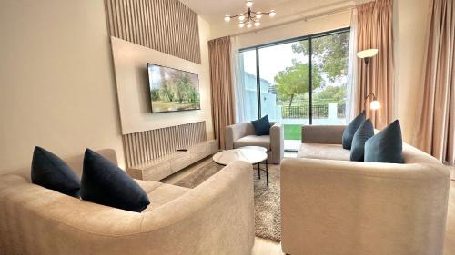 Dubai Villa | Serene Green Escape and Stunning Views in DAMAC Hills 1 by Bhavan Vacation Homes