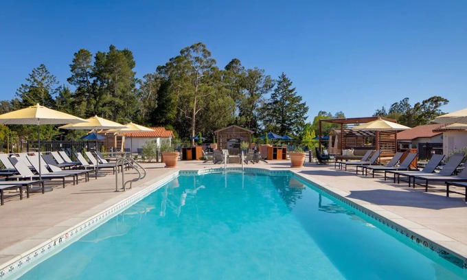 Live Oak Hotel | Serenity Now: Your Santa Cruz Retreat with Deck, Pool & Fireside Relaxation