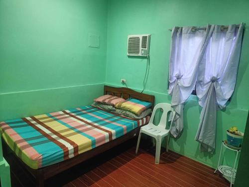 Puerto Princesa City Centre Hotel | SEVENNE INN TRANSIENT House