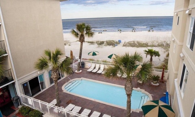 Tybee Island Hotel | Sharply Appointed Room w/Free WiFi & Shared Walkway Balcony