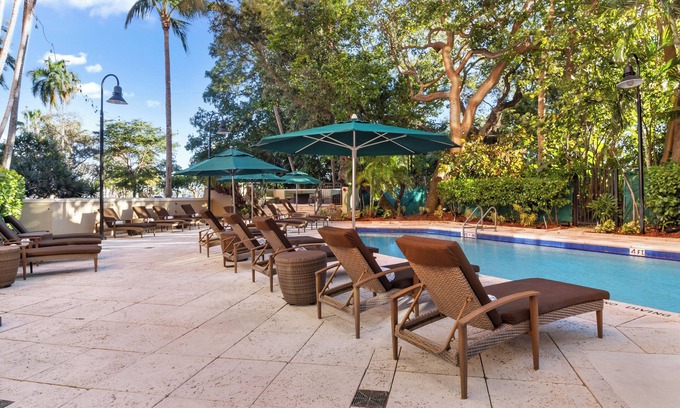 Coconut Grove Hotel | Short Distance From Dinner Key Marina! Three Relaxing Units with Full Kitchen!