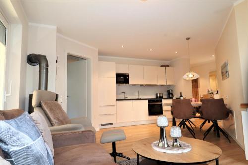 Fedderwardersiel Apartment | Sielhuus 5, Ferienwohnung mit Sauna in Fedderwardersiel