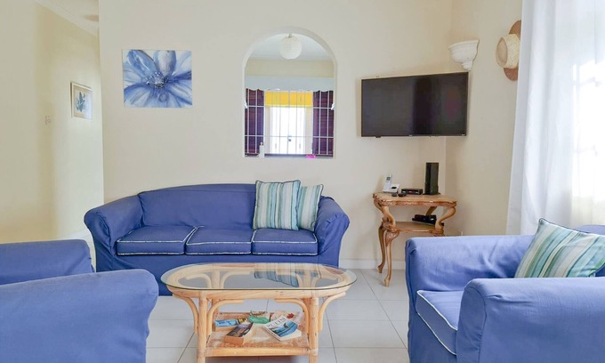 Silver Sands Apartment | Silver Sands Beachfront Condo, Indoor & Outdoor Dining, Shared Patio - Bar & BBQ