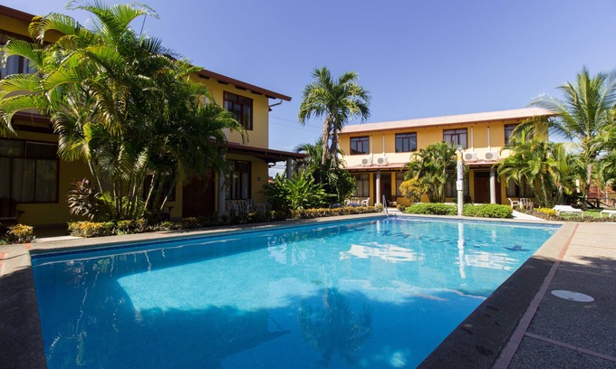 Barrio Ricos y Famosos Apartment | Simon Apt 2: Cozy 3-bedroom apartment within walking distance of Jaco Beach