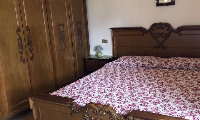 Solanas Apartment | Solanas, large double room with sea and beach views