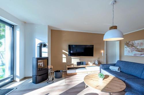 Krakow am See Apartment | Sonnengruß - Stilvolles Apartment mit Balkon, Kamin & Wellness-Flair am Krakower See